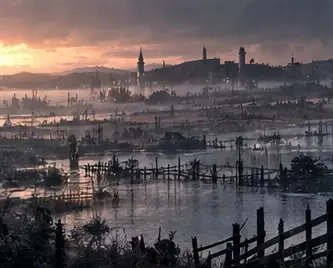 Flooded farmland and broken fences at dusk